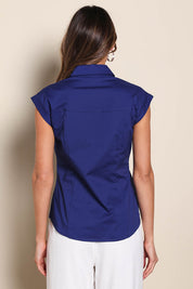 Model Madelinec wearing size 10 of the The Cap Sleeve Cotton Stretch Shirt - Indigoblue in colour Indigoblue, from the back