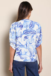 Model Madelinec wearing size 10 of the The Dolman Sleeve Button Up Shirt – Bluemarble in colour Bluemarble, from the back