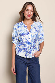 Model Madelinec wearing size 10 of the The Dolman Sleeve Button Up Shirt – Bluemarble in colour Bluemarble, in a cropped view