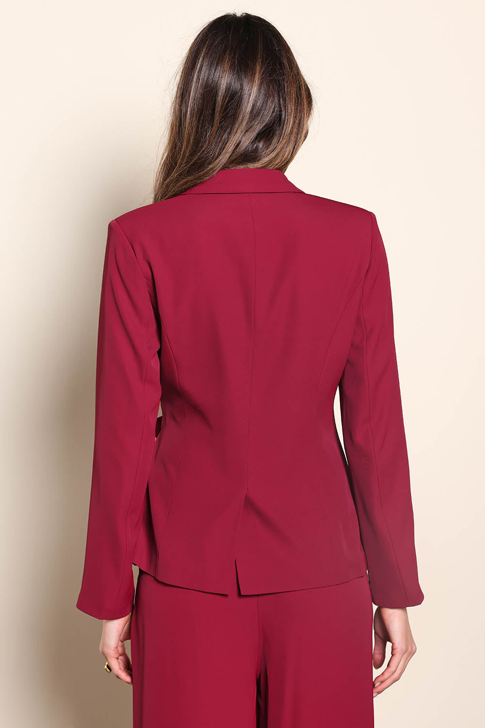 Model Madelinec wearing size 10 of the The Soft Suiting Lined Blazer – Burgundy in colour Burgundy, from the back