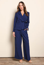 Model Madelinec wearing size 10 of the The Soft Suiting Lined Blazer – Navy in colour Navy, from the front