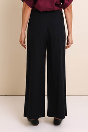 Model Amandam wearing size 10 of the The Linen Blend Tailored Pant - Black in colour Black, from the back