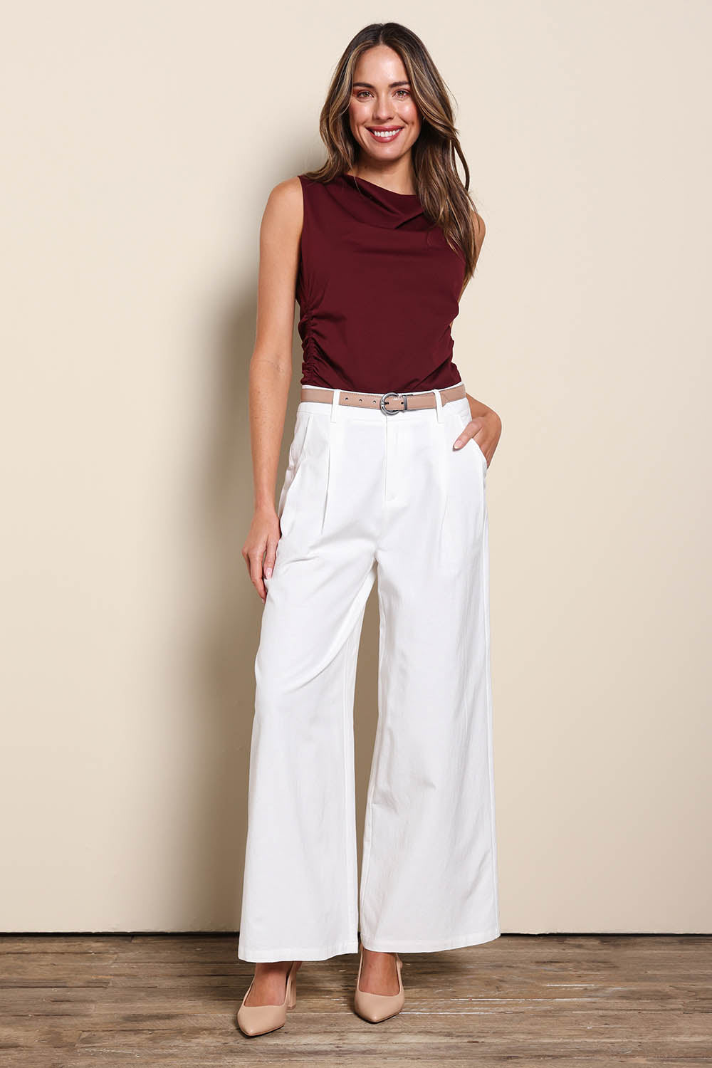 Model Madelinec wearing size 10 of the The Linen Blend Tailored Pant - Snow in colour Snow, from the front