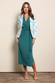 Model Madelinec wearing size 10 of the The All Season Faux Wrap Knit Dress – Jewel in colour Jewel, from the front