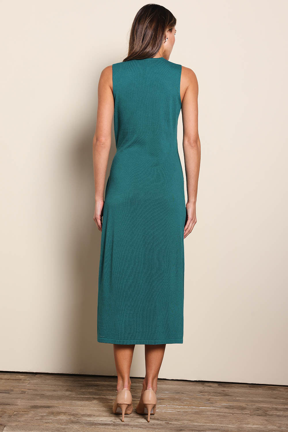 Model Madelinec wearing size 10 of the The All Season Faux Wrap Knit Dress – Jewel in colour Jewel, from the front