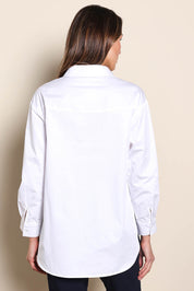 Model Madelinec wearing size 10 of the The Luxe Cotton Popover Shirt – White in colour White, from the back