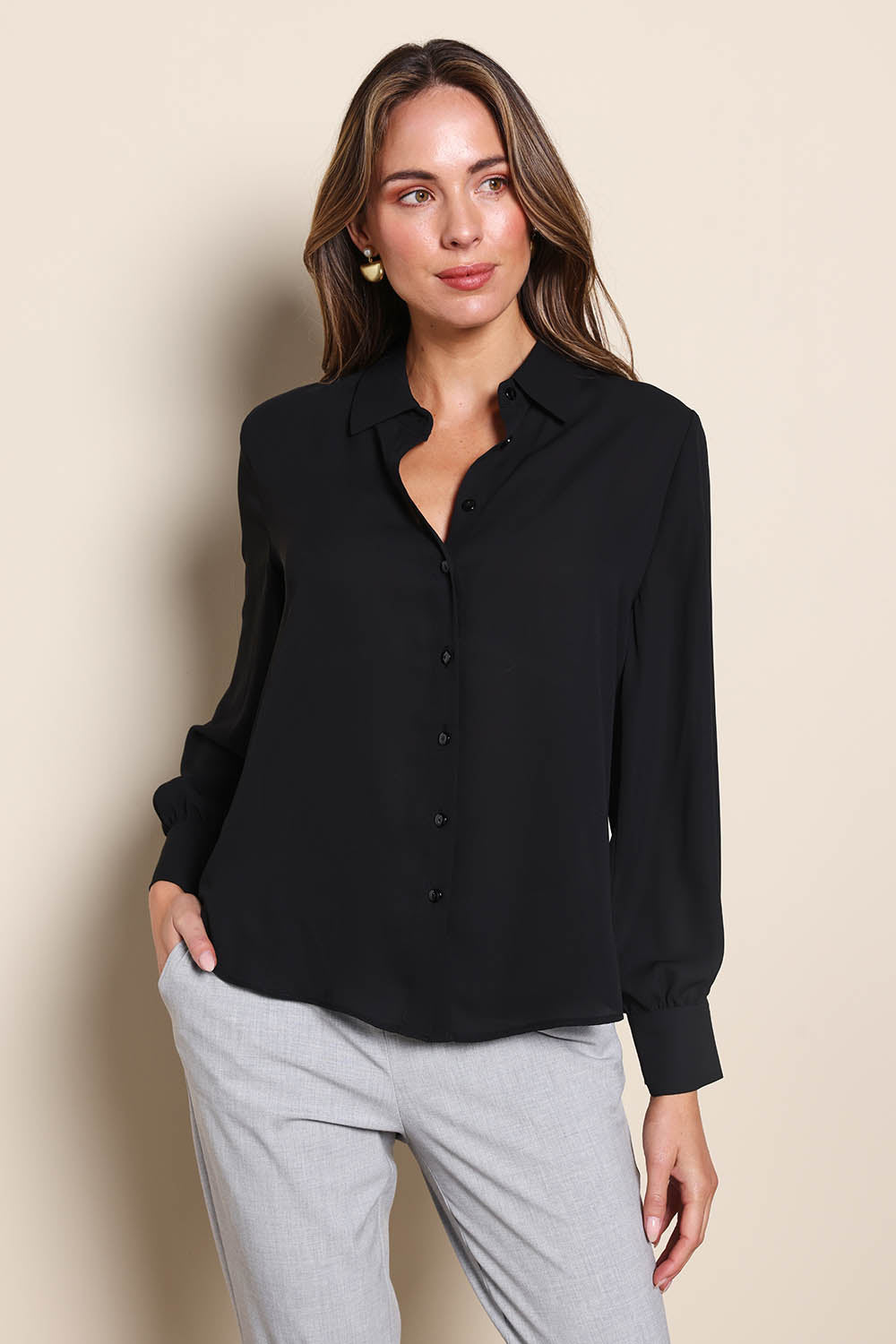 Model Madelinec wearing size 10 of the The Allure Georgette Shirt – Black in colour Black, in a cropped view