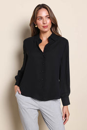 Model Madelinec wearing size 10 of the The Allure Georgette Shirt – Black in colour Black, in a cropped view