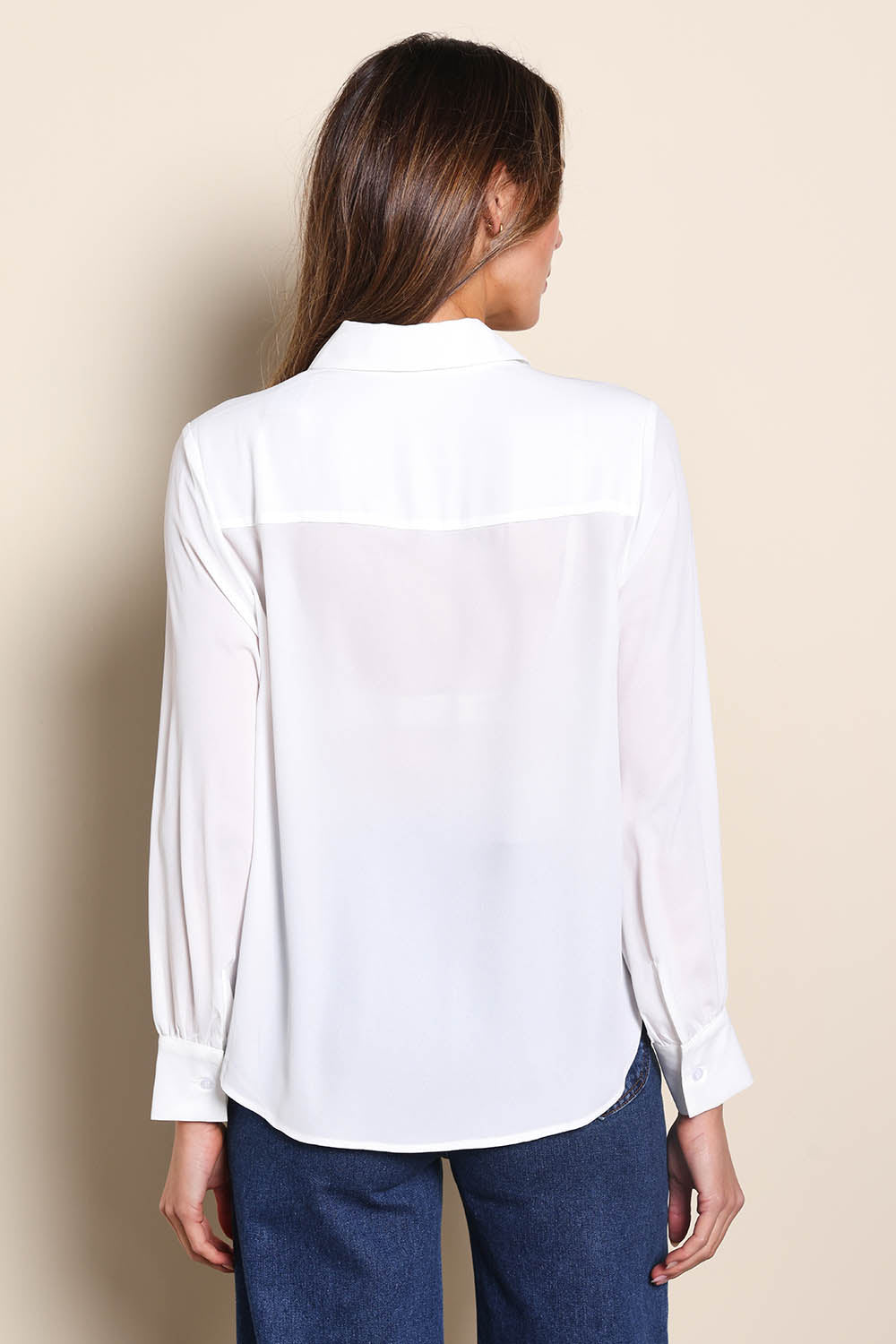 Model Madelinec wearing size 10 of the The Allure Georgette Shirt – Ivory in colour Ivory, from the back
