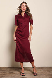 Model Madelinec wearing size 10 of the The Linen Tencel Modish Dress - Burgundy in colour Burgundy, from the front