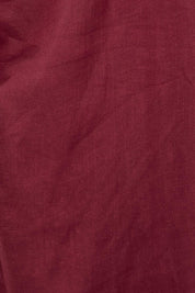 Product shot of the The Linen Tencel Modish Dress - Burgundy in colour Burgundy, showing detail