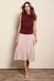 Model Madelinec wearing size 10 of the The Bias Panel Check Skirt - Sand in colour Sand, from the front