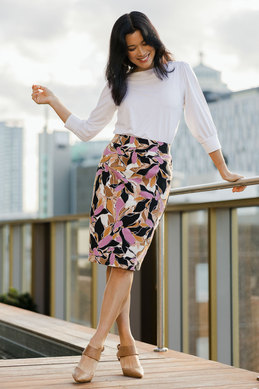 Model Miranda wearing size 10 of The Tube Skirt in colour Abstract, from the front, showing the whole outfit