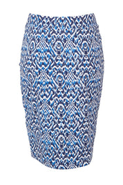 Product shot of The Tube Skirt in colour Abstract (Blue), from the back