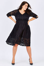 Model Mae wearing size 18 of The 3/4 Sleeve Lace Dress in colour Black (Black), from the front, showing the whole outfit
