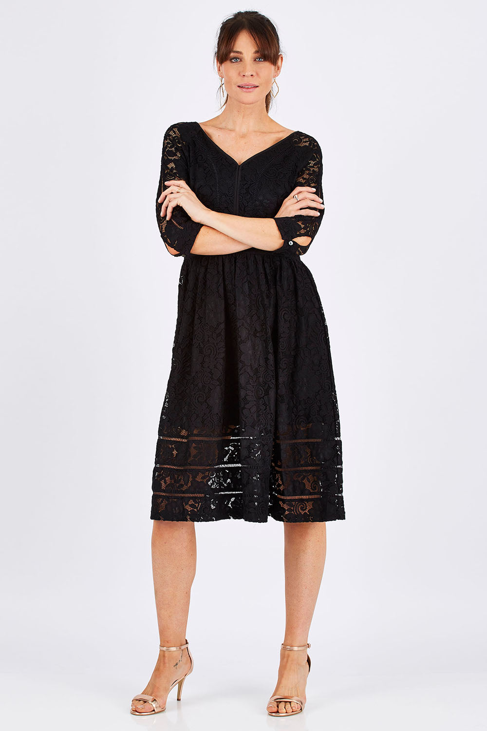 Model Monique wearing size 8 of The 3/4 Sleeve Lace Dress in colour Black (Black), from the front, showing the whole outfit
