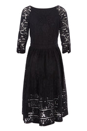 Product shot of The 3/4 Sleeve Lace Dress in colour Black (Black), from the back