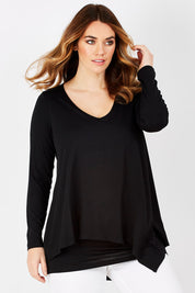 Model Laura wearing size 12 of the Belle V Neck Forgiver Tunic in colour Black (Black), from the front, cropped image