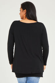 Model Terri-Leigh wearing size 14 of the Belle V Neck Forgiver Tunic in colour Black (Black), from the back