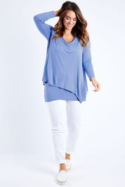Model Laura wearing size 14 of the Belle V Neck Forgiver Tunic in colour Bluebonnet (Blue), from the front, showing the whole outfit