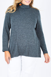 Model Fiona wearing size 16 of the Belle Cowl Swing Sweater in colour Green (Green), from the front, showing the whole outfit