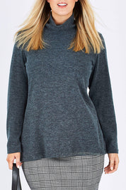 Model Jess wearing size 12 of the Belle Cowl Swing Sweater in colour Green (Green), from the front, cropped image