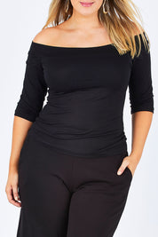 Model Jess wearing size 12 of the Belle Half Sleeve Boat Tee in colour Black (Black), from the front, cropped image