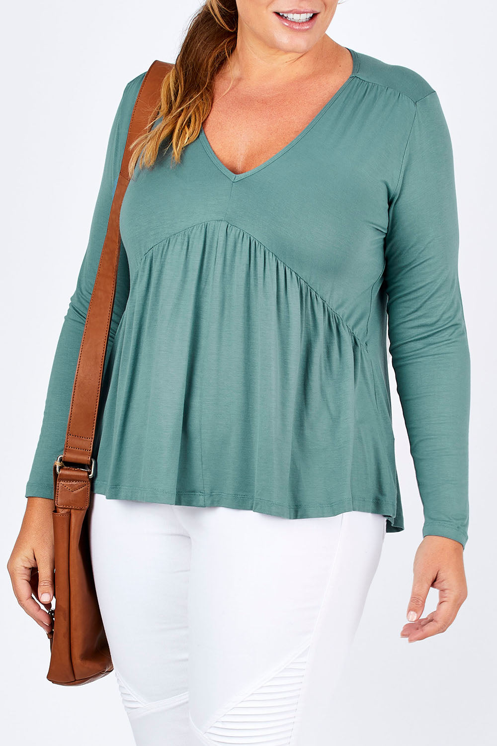 Model Fiona wearing size 16 of the Belle Ls Free Fall Tee in colour Greenland (Green), from the front, cropped image