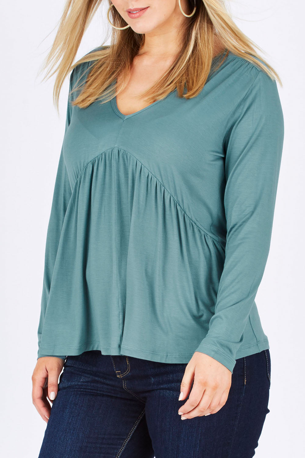 Model Jess wearing size 12 of the Belle Ls Free Fall Tee in colour Greenland (Green), from the front, cropped image
