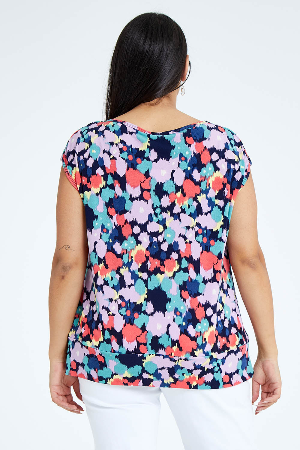 Model Sasha-Lee wearing size 16 of the Belle Printed Knit Square Neck Top in colour Vibrant (Blue), from the back