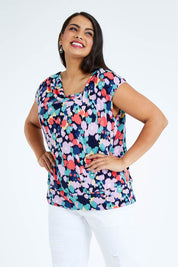 Model Sasha-Lee wearing size 16 of the Belle Printed Knit Square Neck Top in colour Vibrant (Blue), from the front, cropped image