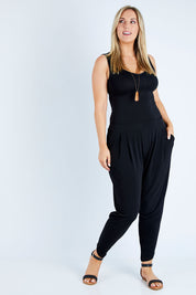 Model Jess wearing size 12 of the Belle Taper Pant in colour Black (Black), from the front, showing the whole outfit