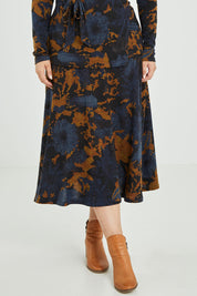 Model Jess wearing size 12 of the Belle Python Knit Full Skirt in colour Python (Blue), from the front, cropped image
