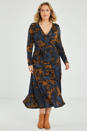 Model Jess wearing size 12 of the Belle Python Knit Full Skirt in colour Python (Blue), from the front, showing the whole outfit