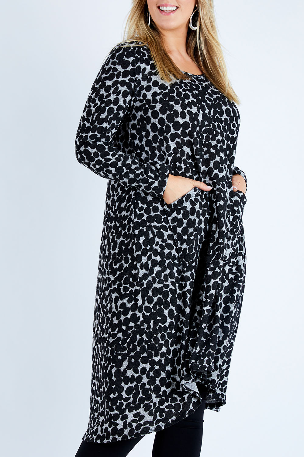 Model Jess wearing size 12 of the Belle Wooly Knit Dress in colour Greydot (Grey), from the front, cropped image