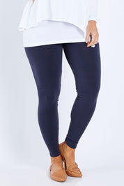 Model Laura wearing size 12 of the Belle Legging in colour Charcoal (Grey), from the front, cropped image