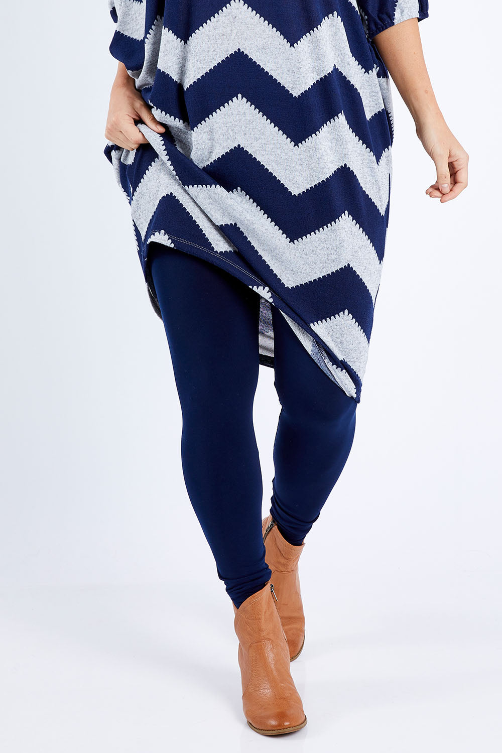 Model Laura wearing size 12 of the Belle Legging in colour Navy (Blue), from the front, cropped image