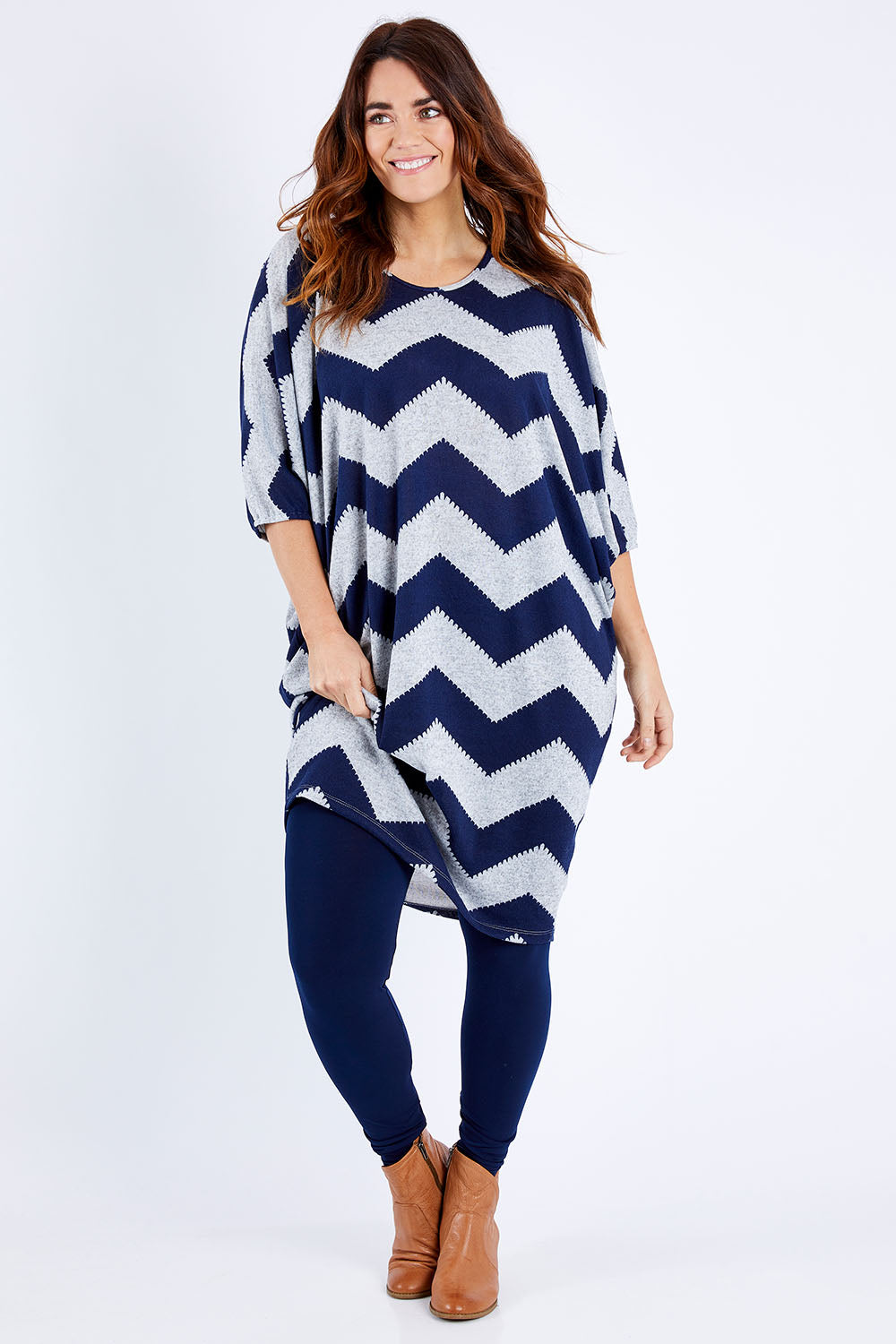 Model Laura wearing size 12 of the Belle Legging in colour Navy (Blue), from the front, showing the whole outfit