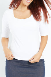 Model Laura wearing size 12 of the Belle Rib Square Neck Tee in colour White (White), from the front, cropped image