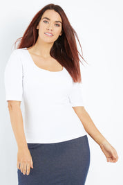 Model Laura wearing size 12 of the Belle Rib Square Neck Tee in colour White (White), from the front, cropped image