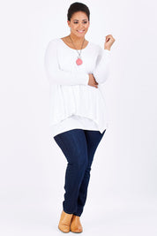 Model Shareefa wearing size 18 of the Belle Forgiver Tunic in colour White (White), from the front, showing the whole outfit