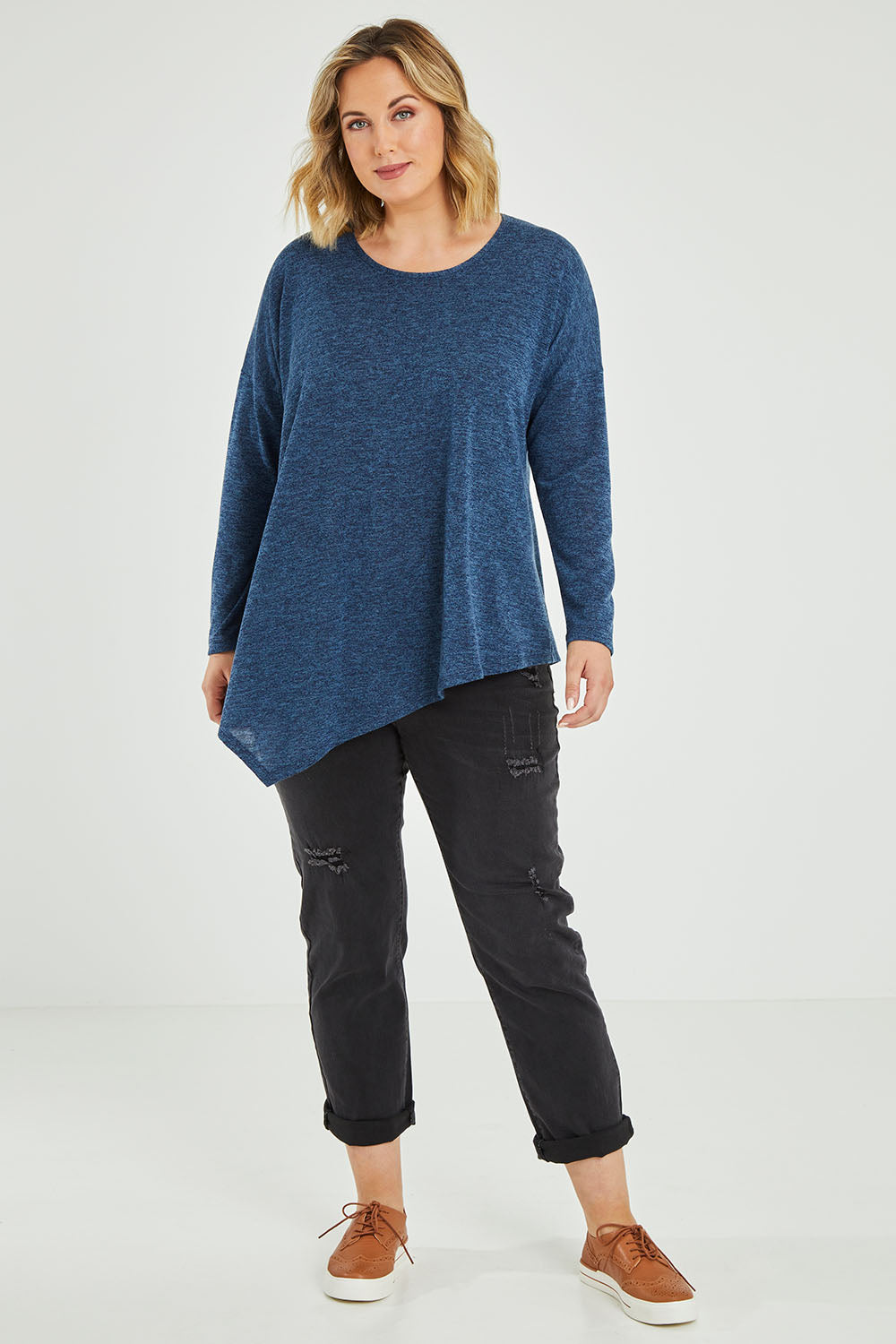 Model Jess wearing size 14 of the Belle Wooly Knit Throw Over in colour Denimblue (Blue), from the front, showing the whole outfit