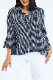 Model Sasha-Lee wearing size 16 of the Belle Seam Detail Check Blouse in colour Check (Blue), from the front, cropped image