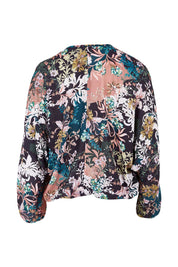 Product shot of the Belle Blossom Floral Wrap Top in colour Blossom, from the back