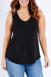 Model Laura wearing size 12 of the Belle Essential V Neck Cami in colour Black (Black), from the front, cropped image