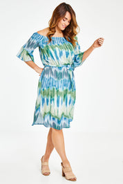 Model Laura wearing size 12 of the Belle Tie Dye Dress in colour Tiedye (Blue), from the front, showing the whole outfit