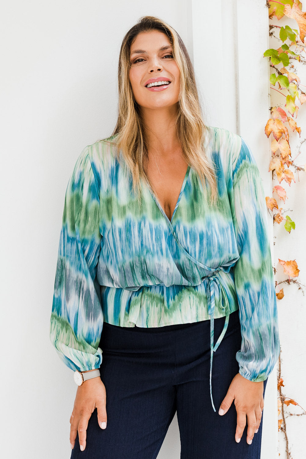 Model Palatina wearing size 16 of the Belle Tie Dye Top in colour Tiedye (Blue), from the front, showing the whole outfit