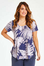 Model Laura wearing size 12 of the Belle Fern Print Top in colour Fern (Blue), from the front, cropped image