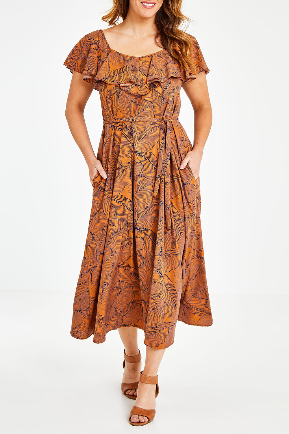 Model Laura wearing size 12 of the Belle Frill Trim Maxi Dress in colour Monoprint, from the front, cropped image