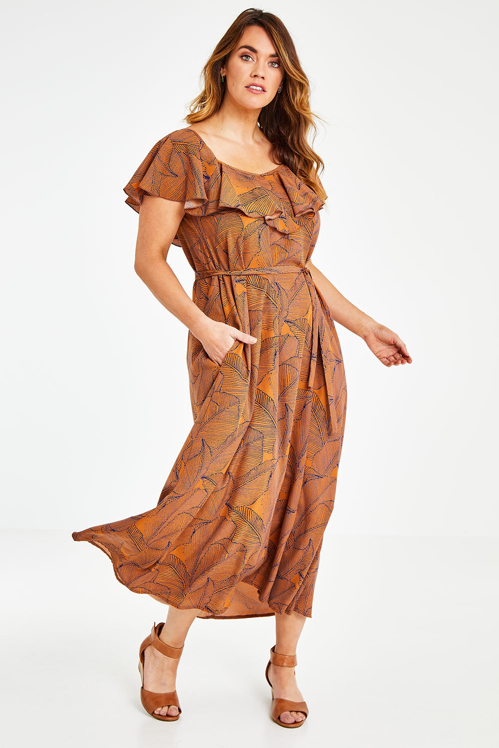 Model Laura wearing size 12 of the Belle Frill Trim Maxi Dress in colour Monoprint, from the front, showing the whole outfit